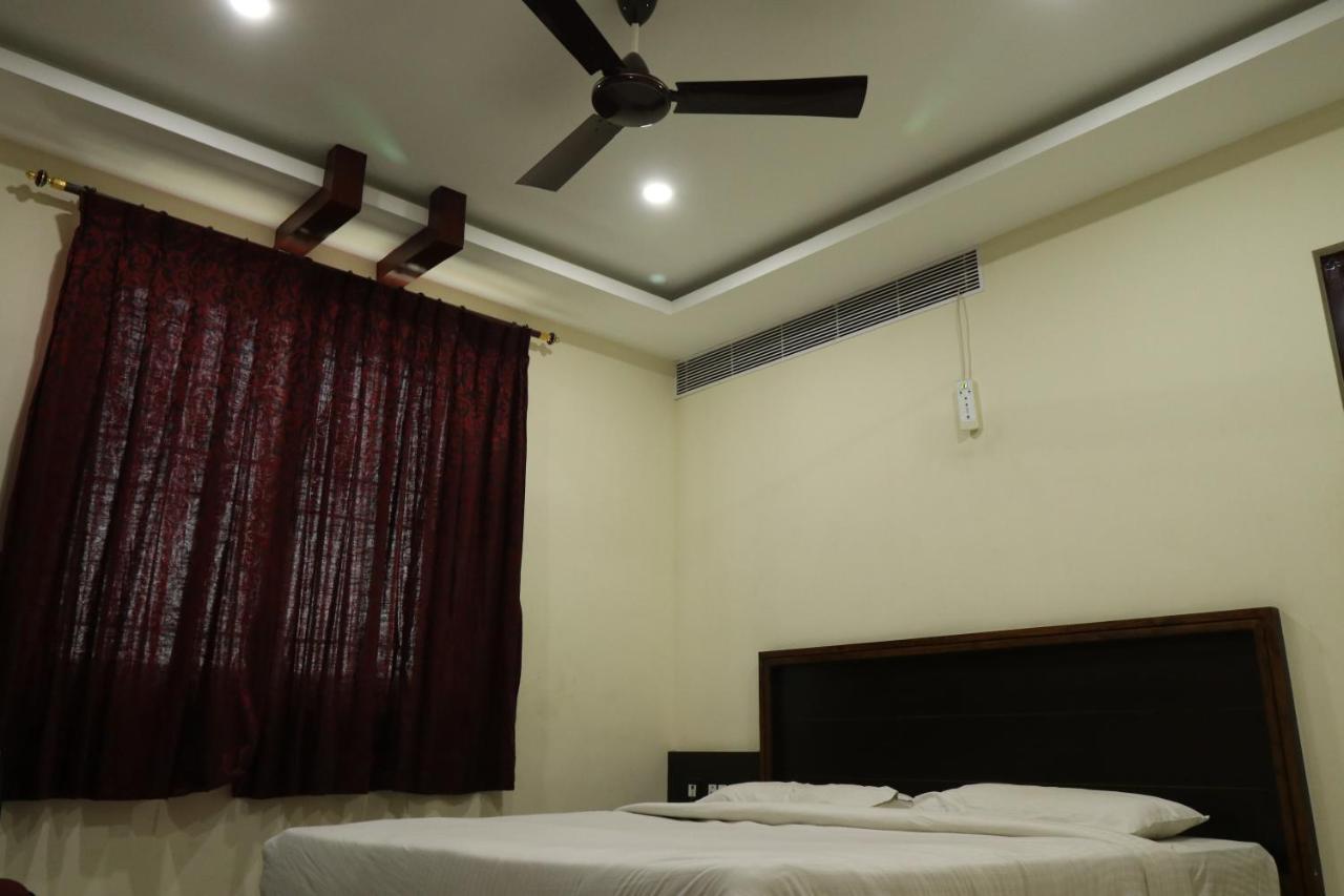 E S Residency Hotel Theni Exterior photo